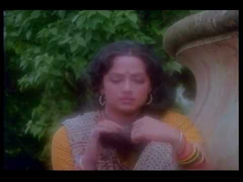 Daakiya Daak Laaya Lyrics - Kishore Kumar