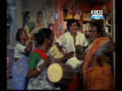 Hum To Ek Anari Hai Lyrics - Kishore Kumar, Mehmood Ali